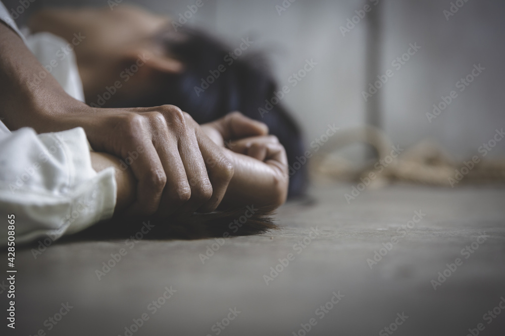 Close up of man hands holding a woman hands for rape and sexual abuse, domestic violence, anti-trafficking and stopping violence against women, - obrazy, fototapety, plakaty 