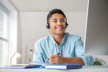 African-American student studying online at home
