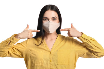 Canvas Print - Stylish young woman wearing mask on white background