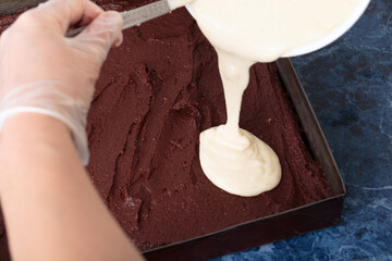 Wall Mural - Making a cheese brownie with cheesecake.