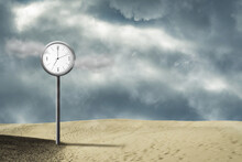 Street Clock In The Sand Dunes. Cloudy Sky. Time Concept. Business. Lifestyle.