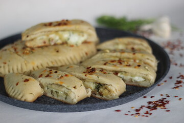 Home baked garlic bread filled with mozzarella cheese.