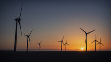 Panoramic Shot Of Windmills At Sunset Near Busum, Germany
