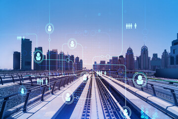 The way towards skyscrapers by modern futuristic train. Tech railway delivers commuters to the financial downtown of Dubai. social network concept. people icon drawings. Double exposure