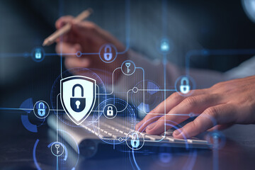 a programmer is typing a code on computer to protect a cyber security from hacker attacks and save c