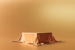 Gold product background stand or podium pedestal on luxury advertising display with satin backdrops. 3D rendering.