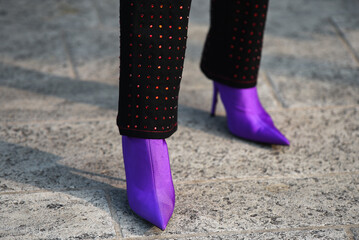 Wall Mural - Detail of a fashionable outfit – woman wearing mauve shoes and black and pink pants