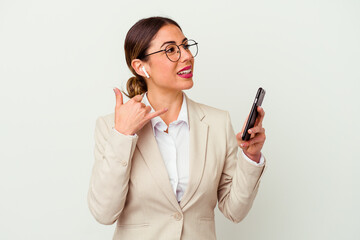 Young business woman holding a mobile phone isolated on white background