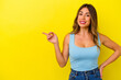 © Asier - Young caucasian woman isolated on yellow background