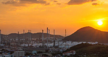 Oil refinery gas and petrochemical industry sunset