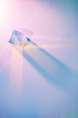 Wall Mural - Glass cube with color spectrum rays. Abstract background with reflection and refraction of light. Shadow and rays of natural light effects..