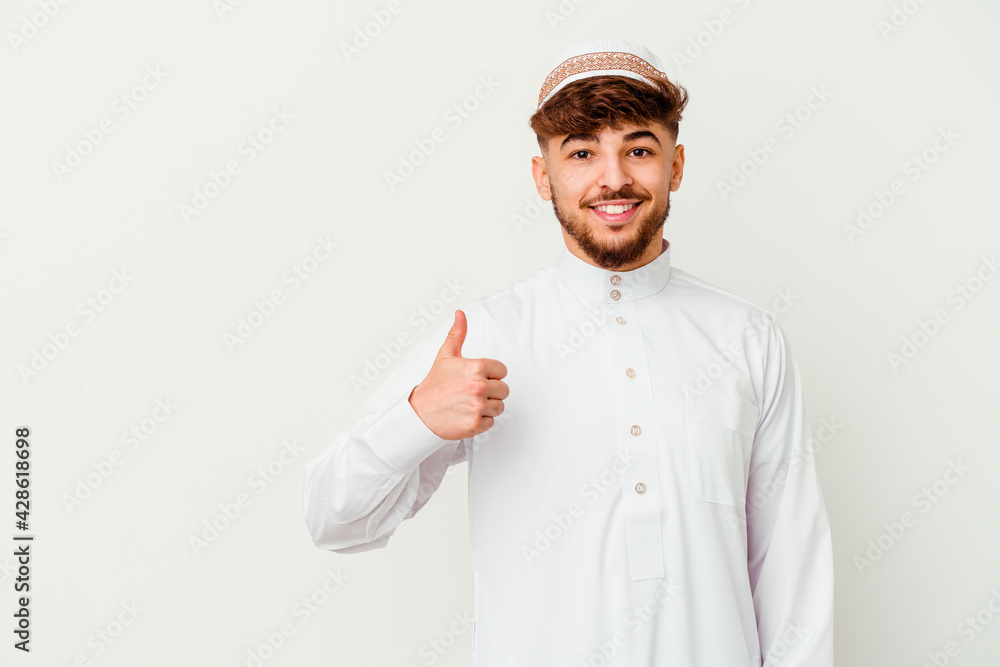 Typical Arab Young Arab man wearing the typical arabic costume isolated on white ...