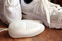 Sports Shoes Care. Electric Shoes Dryer With UV Sterilization