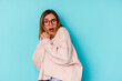 © Asier - Young student caucasian woman isolated on blue background scared and afraid.
