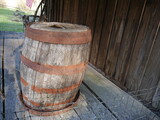 Fototapeta  - old wooden barrel on farmhouse porch