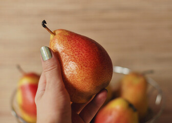 pear in a hand