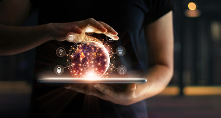 Leinwandbilder - Man holding virtual globe with marketing network connecting icons on tablet. Innovation technology develop sustainable future service and smart solution in global business.