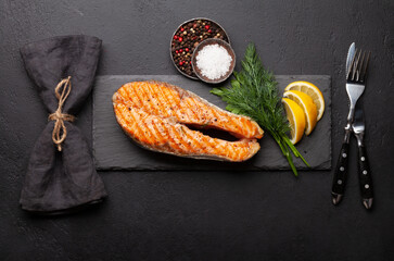 Sticker - Grilled salmon steak. Fish steak with herbs and spices