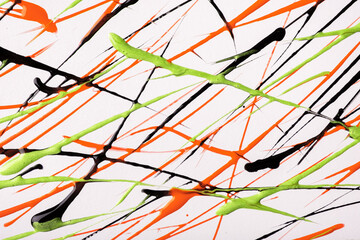 Thin green and black lines and splashes drawn on white background. Abstract art backdrop