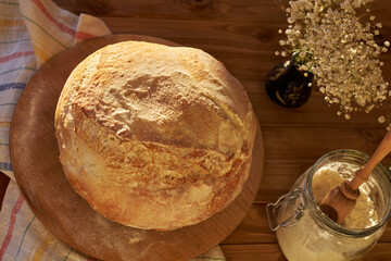 Wall Mural - Homemade sourdough bread, side view.