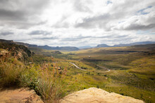 Over Looking Valley With Winding Road And Rolling Hills In Golden Gate National Park, Free State. 