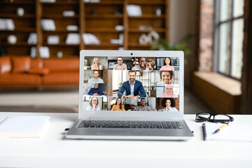 Wall Mural - Laptop screen webcam view different ethnicity age people engaged in group videocall. Video conference lead by european businessman leader. Modern technology, easy convenient on-line meeting concept