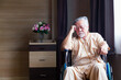 © Thirawatana - Asian senior old man sleeping in wheelchair in nursing home. Elder man on wheelchair in hospital.
