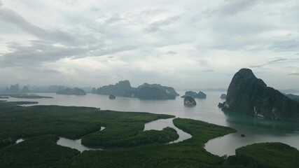 Wall Mural - Aerial view tropical amazing mountains and the ocean blue of Samed Nang Chee popular tourist place in Thailand.