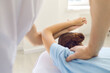 © Studio Romantic - Hands of doctor osteopath fixing woman patients shoulder joints