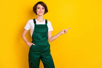 Canvas Print - Photo of pretty person arm in pocket indicate finger empty space proposition isolated on yellow color background