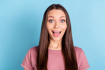 Photo of amazed excited happy young woman reaction information sale isolated on pastel blue color background