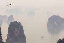 Aerial View Over Misty Ha Long Bay And Tall Rock Pillars