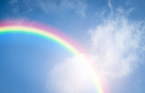 Fototapeta Tęcza - rainbow in cloudy sky