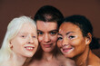 © oneinchpunch - Group of multiethnic women with different kind of skin posing together in studio. Concept about body positivity and self acceptance