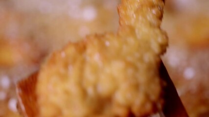 Wall Mural - Frying chicken kid's dinossaur nuggets Macro close up