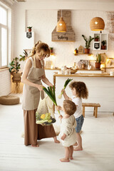 Wall Mural - happy family with their children cooking in the kitchen