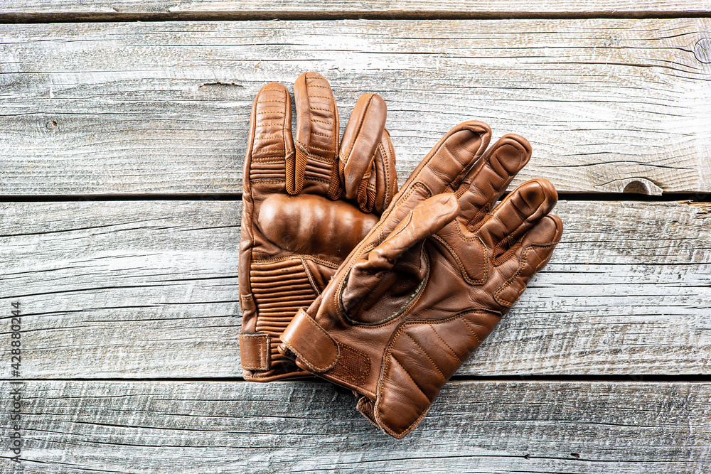 Brown leather motorcycle gloves