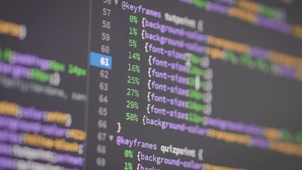 close-up shot programming web editor code for web design and development, select focus shallow depth