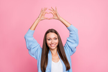 Sticker - Photo of attractive charming cute woman make fingers heart figure isolated on pastel pink color background