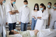 © liderina - Training nurses. Woman nurse demonstrates the medical mannequin to a group of medical student nurses .