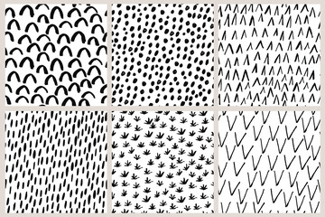 Wall Mural - A set of hand drawn simple abstract seamless patterns.