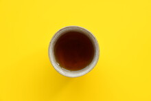 Oolong Tea In A Ceramic Cup On Color Background