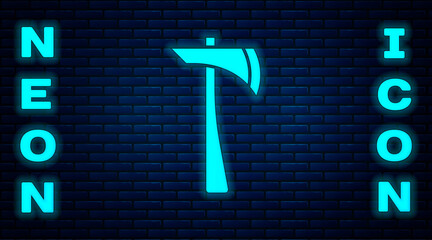 Sticker - Glowing neon Firefighter axe icon isolated on brick wall background. Fire axe. Vector