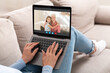 © Prostock-studio - Unrecognizable Woman Using Laptop For Web Chat With Family