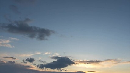 Wall Mural - beautiful clouds in the sky at sunset, time lapse