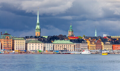 Wall Mural - View of the city embankment on a sunny morning. Stockholm.