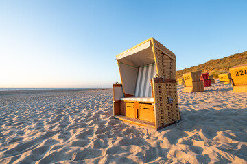 Wall Mural - empty beach chair at the north sea coast, sylt, schleswig-holstein, germany
