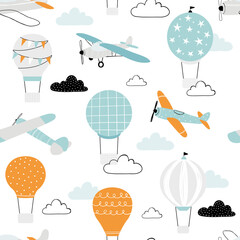 Vector hand-drawn seamless repeating children simple pattern with air balloons, clouds and planes in Scandinavian style on a white background. Kids seamless pattern with aircraft. Funny transport.