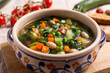Mixed vegetable soup with bread. Minestrone, ideal for a light lunch or dinner