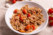 © Noemi - Pasta with tuna, cherry tomatoes and capers. Typical italian dish idea.